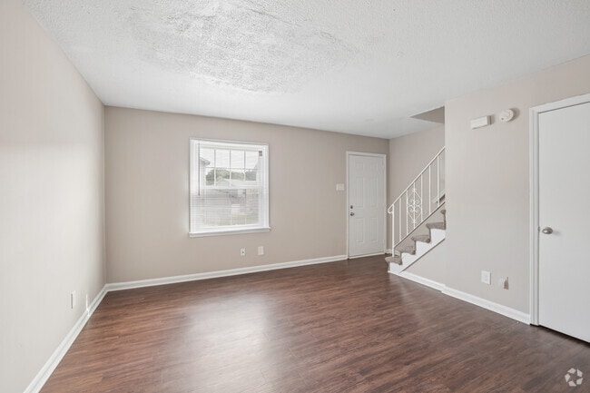 2.1 Townhome 2BR, 1.5BA - 945SF - Living Room - Arcadian Village Apartment Homes