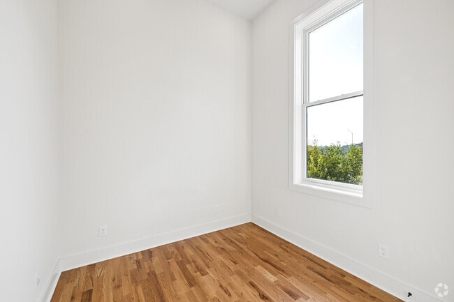 E 5th Avenue 2BR, 2BA - Primary Bedroom - Cortland Buildings