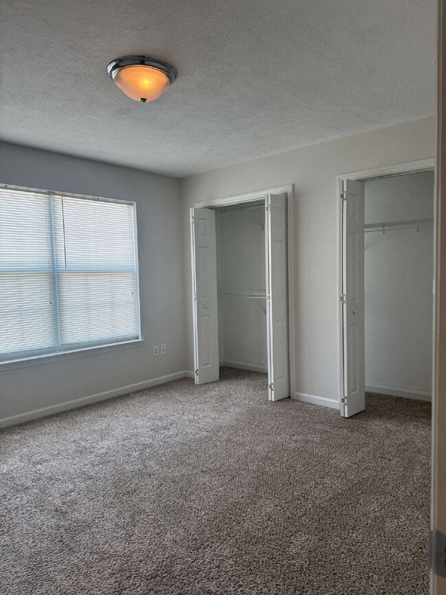 Photo - "Coastal Comfort Awaits: Charming 2-Bed, 2-Bath Townhouse on Catherine Street!" Unit A