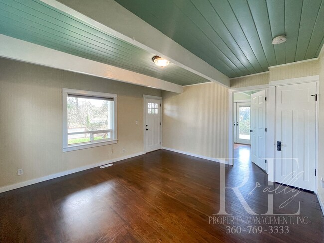 Photo - Whimsical Craftsman with Wraparound Porch, Bonus Room & Liberty Bay Peek Views