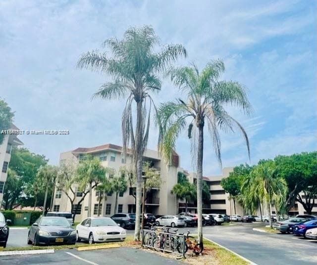 Building Photo - 1811 Sabal Palm Dr Unit 208