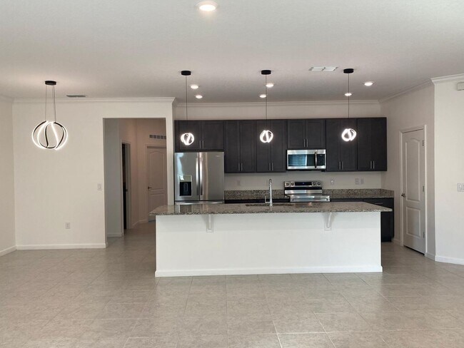 Photo - Like New 3 bedroom + den with French doors, screened in porch and Fenced yard and much more...