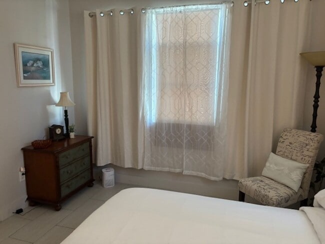 Photo - 2-bedroom 1 bath garage apartment with a garage parking space!!