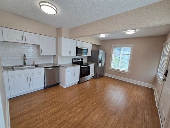 Photo - large three bedroom house with extra living space and finished basement