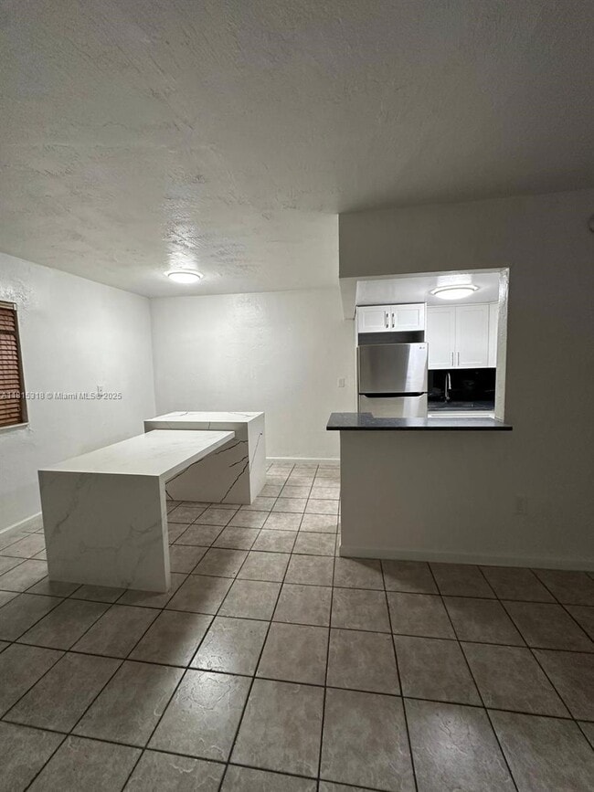 Photo - 1230 W 54th St Unit 325A