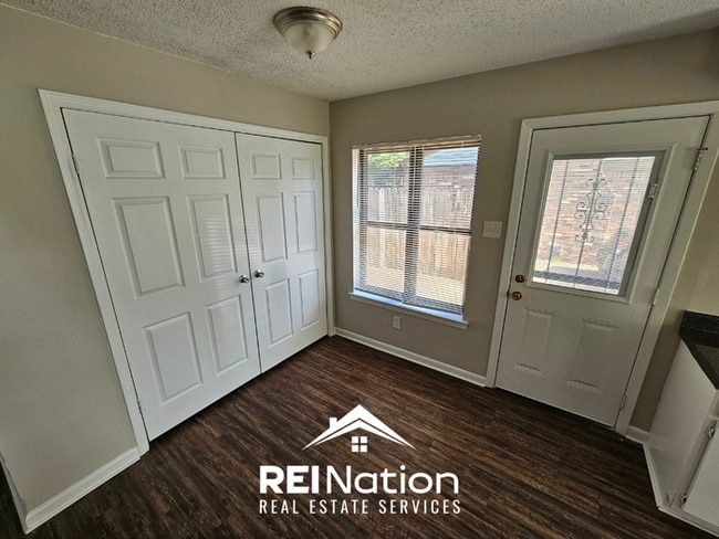 Photo - Move-In Ready 3BR Gem in Memphis - Cozy Fireplace, Tile Dining & Private Yard