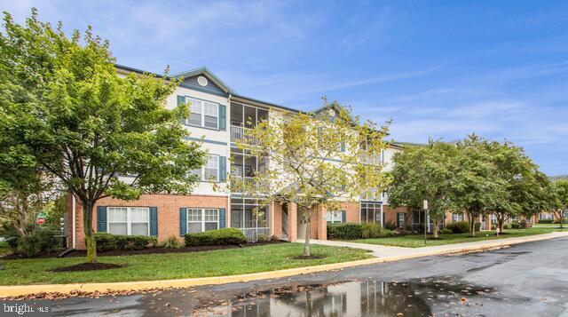 Building Photo - 17054 N Brandt St Unit 1206