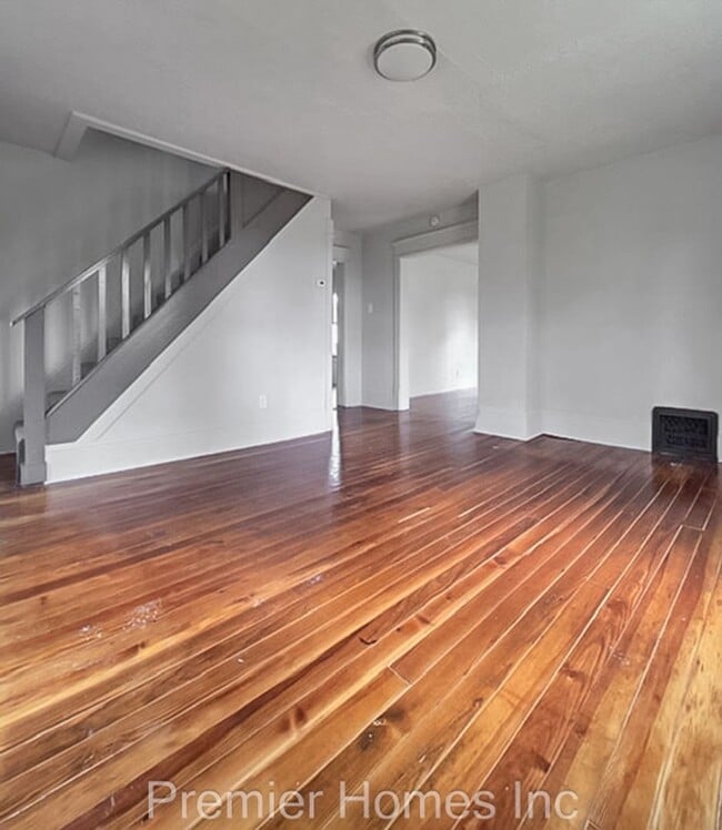 Photo - 3 Bed Home with Hardwood Floors & Rear Deck – $1,495/mo