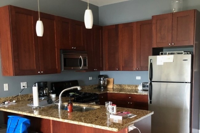 Spacious kitchen with plenty of counter room - 437 W North Ave Unit 605