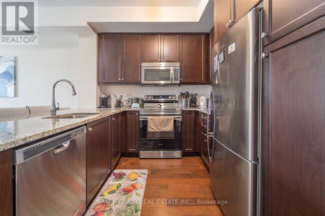 Photo - 3170 Erin Mills Pkwy Unité 234