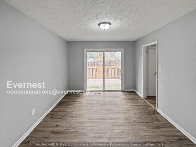 Photo - 4 Bed, 2 Bath Home with Garage / Pet-Friendly / Available Now!