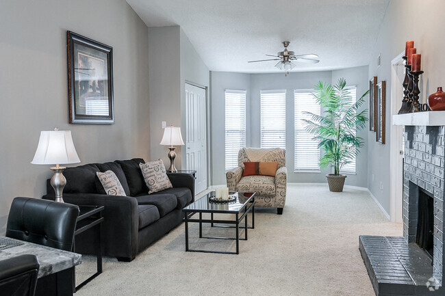 Wood Burning Fireplace and Large Windows in Living Room - Willowbend Rental