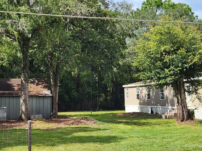 Building Photo - 3 Bed 2 Bath  FENCED land w/ Workshop 3 Miles from WEC!