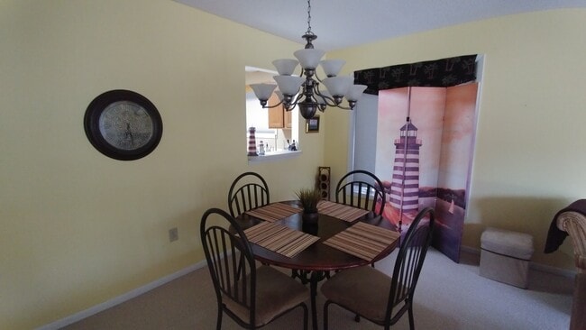 Dining room - 1209 Northlake Dr Unit 1209 Furnished