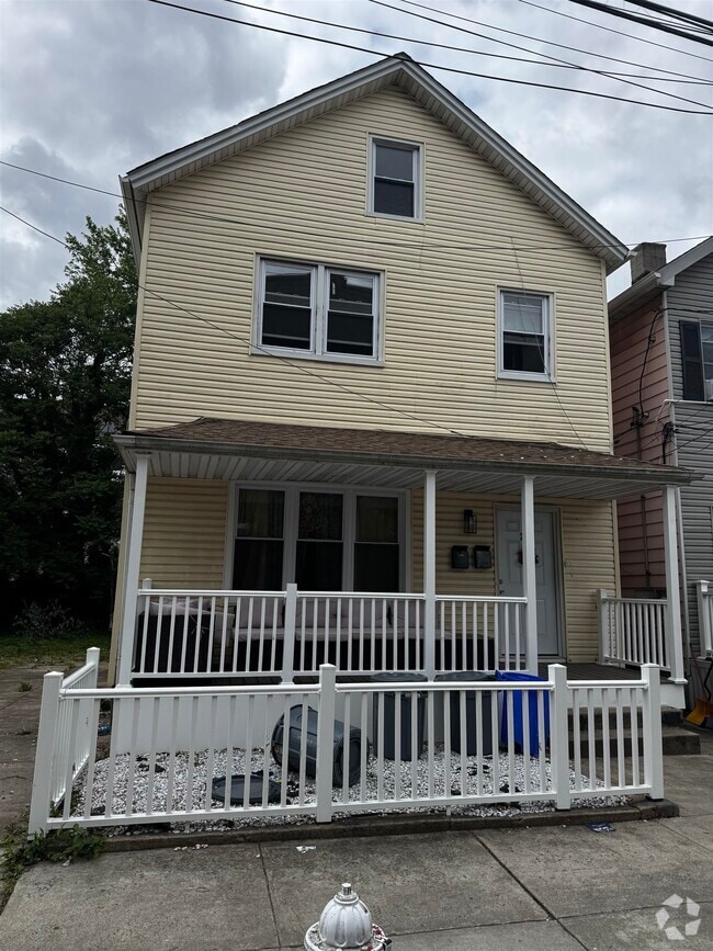 Building Photo - 20 E 11th St Rental