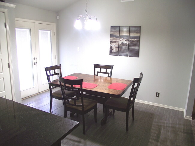 Photo - Sandstone Ranch Estates 4Bed/3Baths home with Refrig A/C and Synthetic Grass Yard!