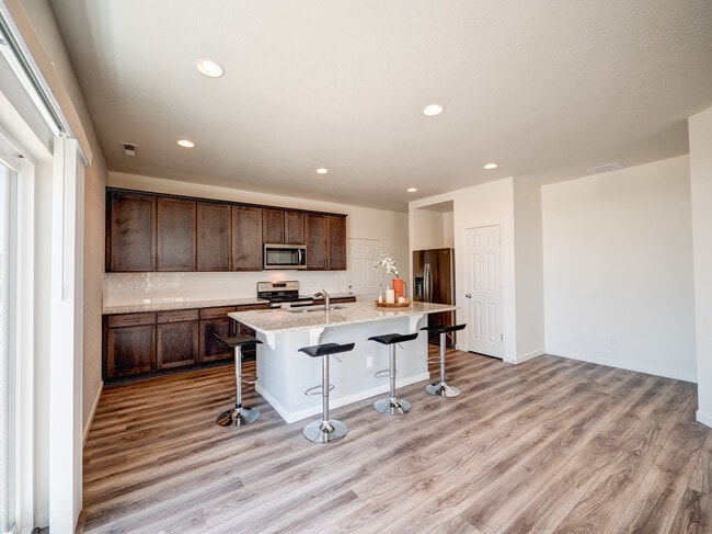 9278 Turlough kitchen includes pantry and drop-zone by garage enty. - 9278 Turlough Hts