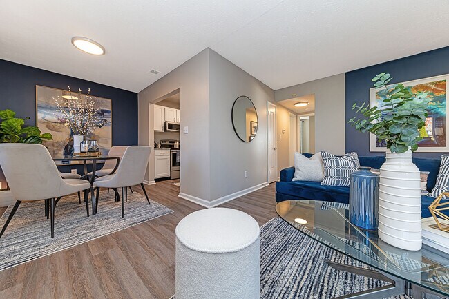 Dining & living area with hardwood-style flooring