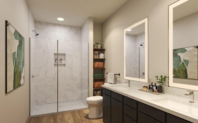 Select apartment homes feature designer bathrooms with double vanities, quartz countertops, and spa-like soaking tubs. - Modera Westside Trail