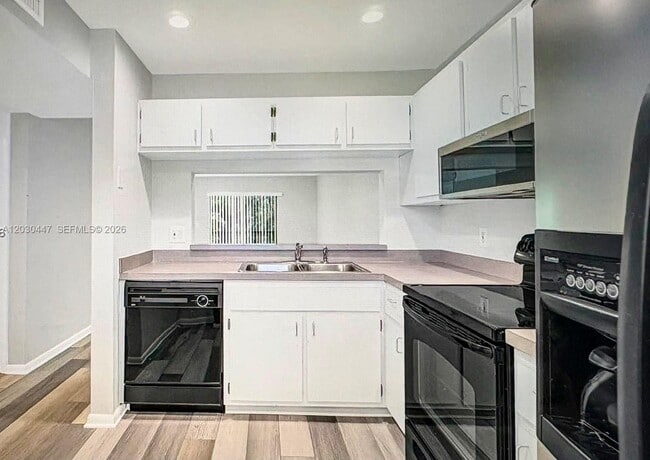 Photo - 6832 Palmetto Cir S Unit 201