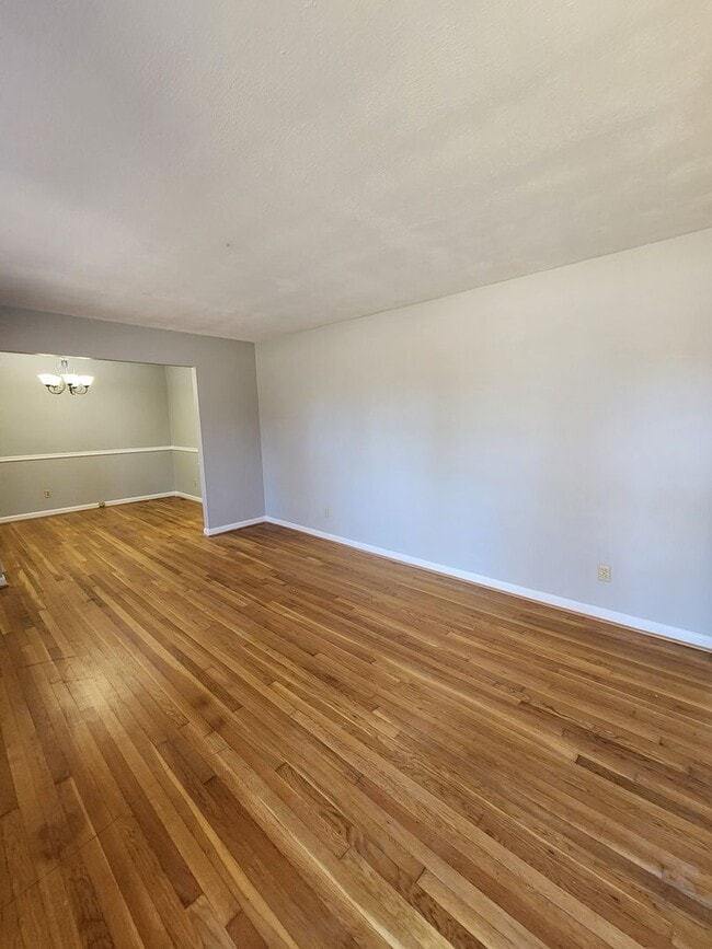 Photo - Spacious 3-Bedroom Brick Home with Two Living Areas & Fenced Backyard!