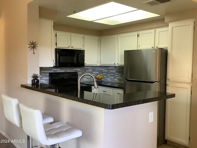 9450 E Becker Ln Unidad 2013
