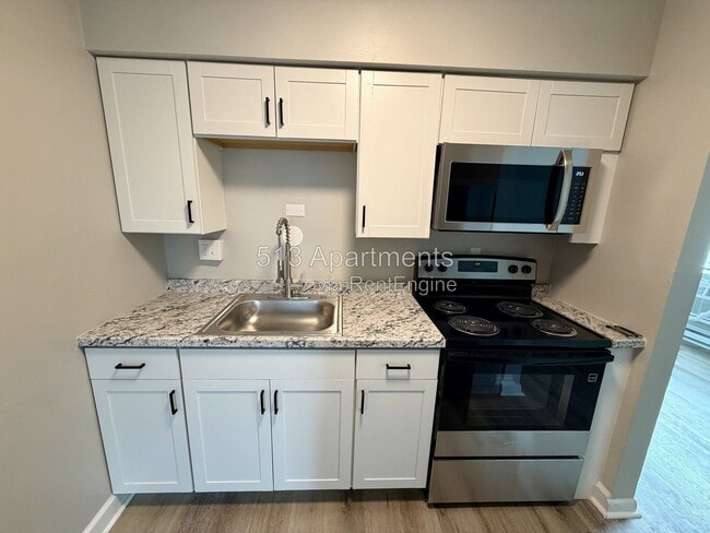 Building Photo - 5146 Carthage Ave Unit 10