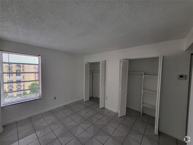 Building Photo - 4801 NW 7th St Unit 702-16 Rental