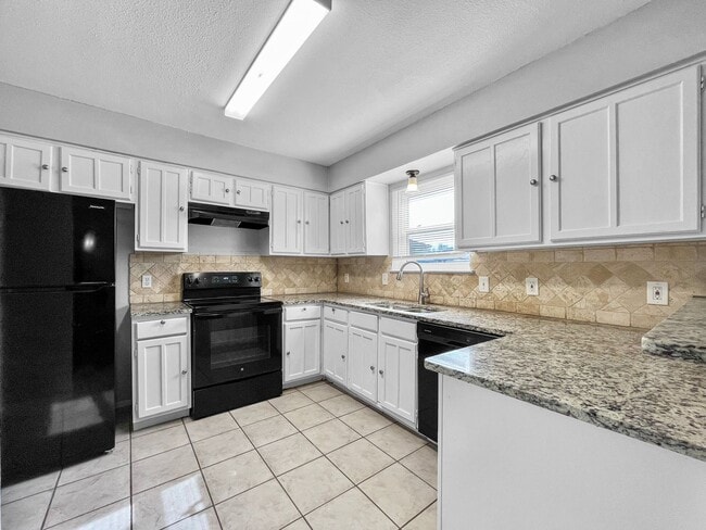 Photo - Updated 3-Bed Woodlake Home with Study & Covered Patio