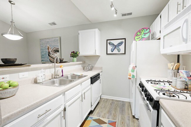 Bright, modern kitchen at Compass Pointe—where style meets everyday comfort.