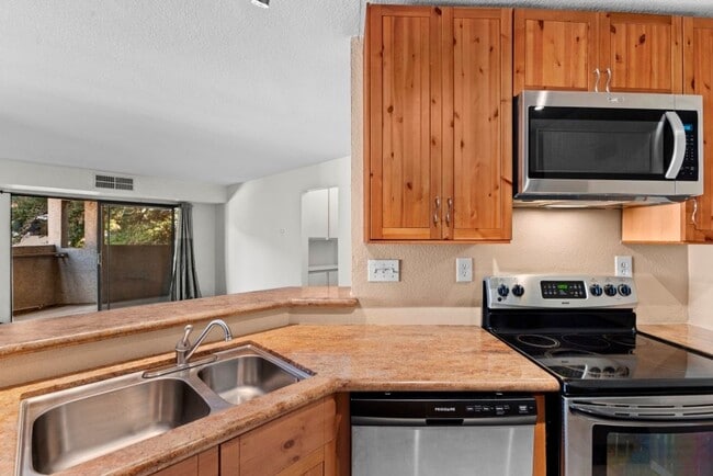 Photo - Stylish 1-Bed Condo with Balcony, Garage & Resort-Style Amenities in Mira Mesa Unit 74
