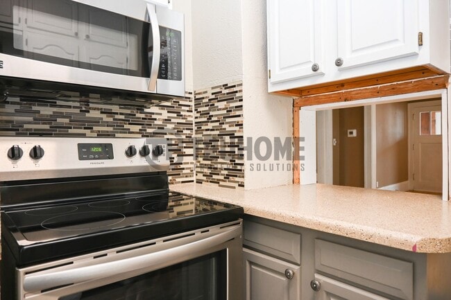 Photo - Large 3 Bedroom 2 Bath House w/Fenced in Yard and 2 Stall Garage Available Soon!