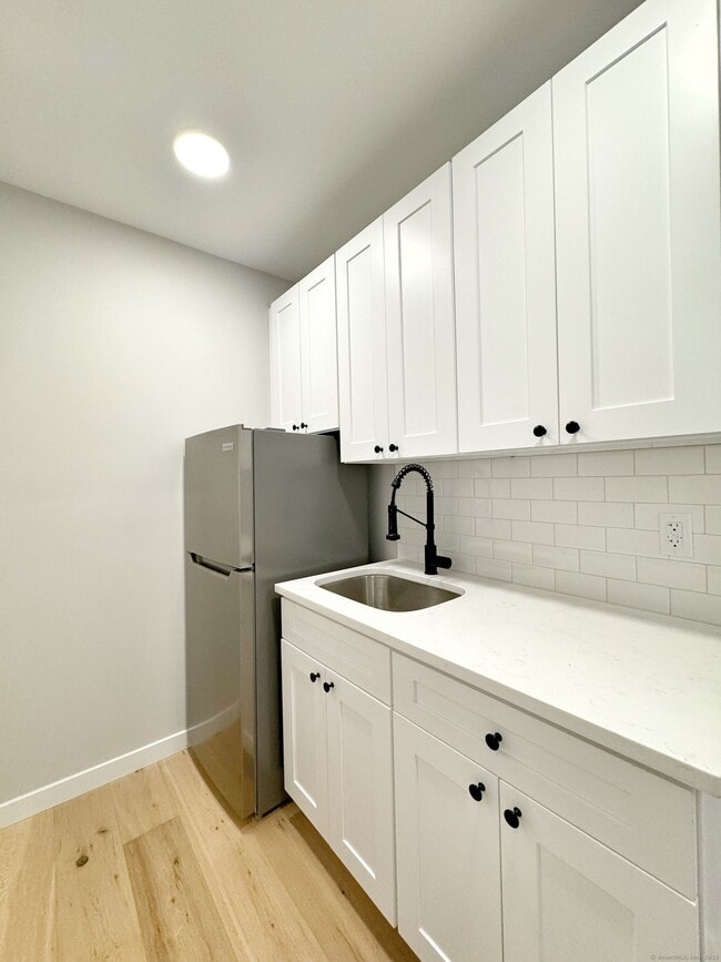Building Photo - 32 Main St Unit 208