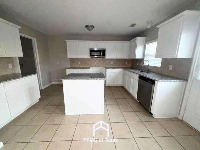 Photo - 18310 Atasca Wds Trce