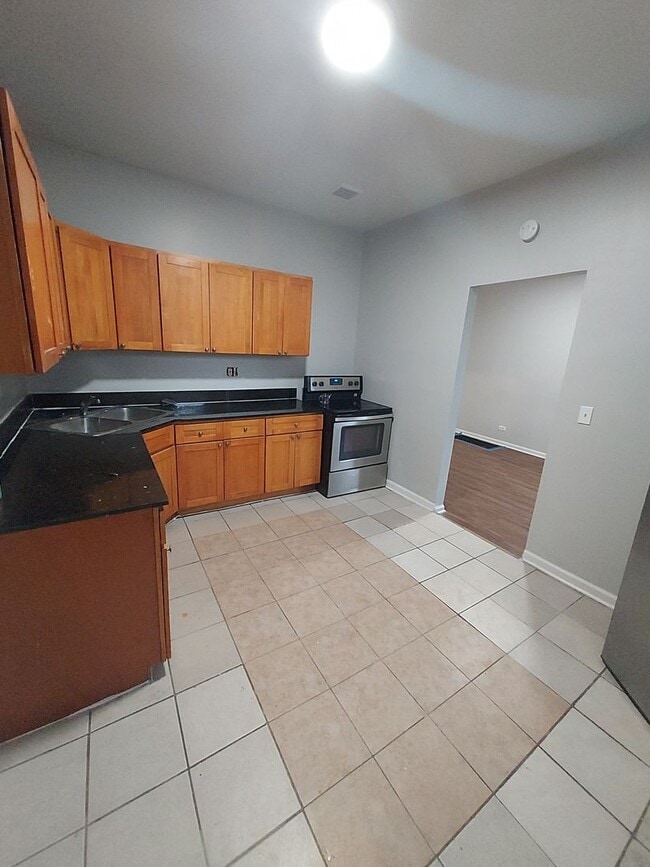 Building Photo - 3434 W 21st St Unit 3434-1