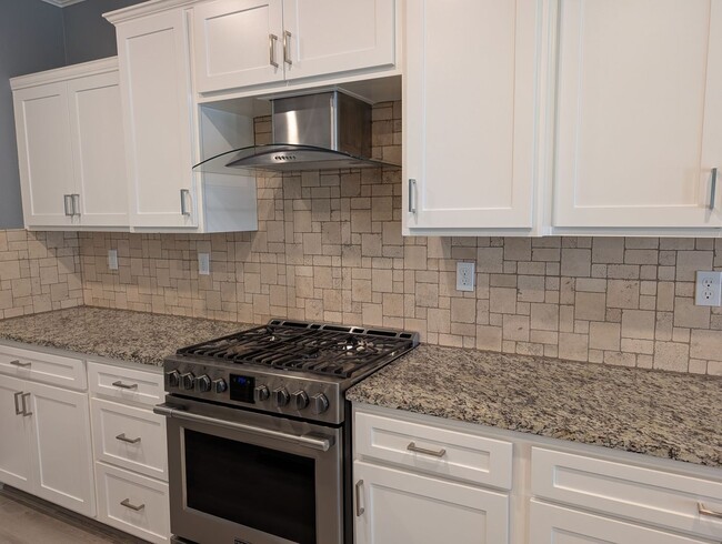Photo - Modern 5 bedroom 3 bathroom home in the Riverstone Community offering solar, In-laws suite, den o...
