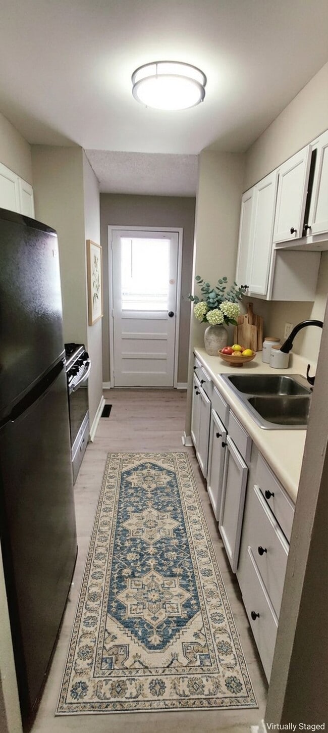 Photo - STERLING COURT APARTMENTS