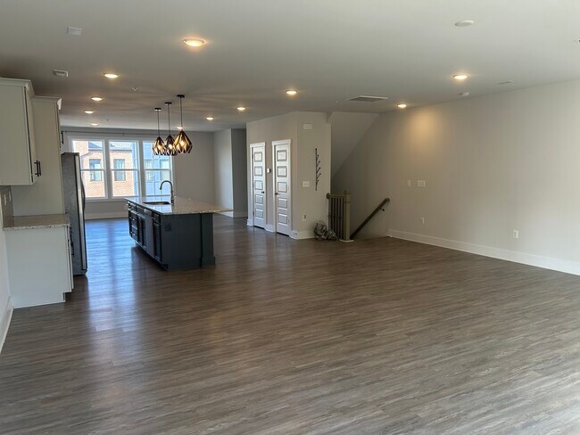 living room to kitchen - 5329 Old Main St Unit B