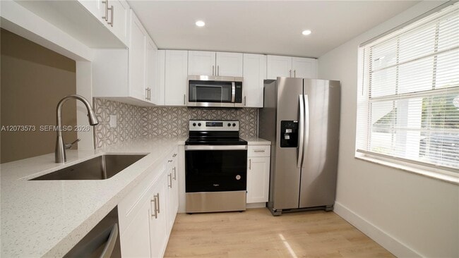 Building Photo - 4291 NW 9th Ave Unit 101