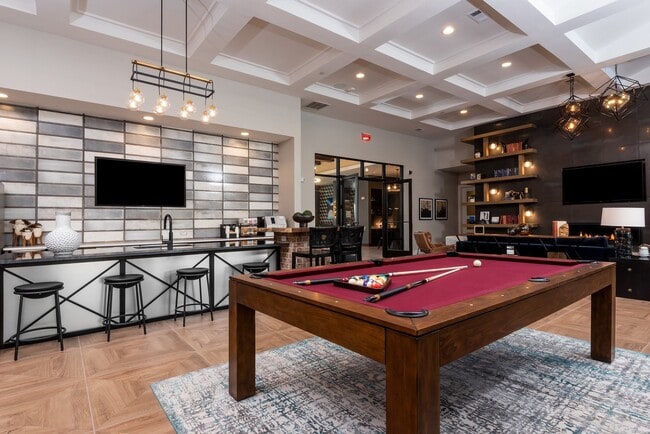 Our sports lounge is complete with a billiards table and bar seating.