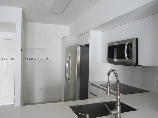 5077 NW 7th St Unit PH12