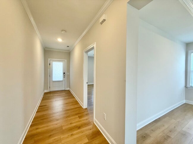 Photo - Luxurious 5BD, 4.5BA Holly Springs Home in an HOA Community with Resort-Style Amenities near Down...