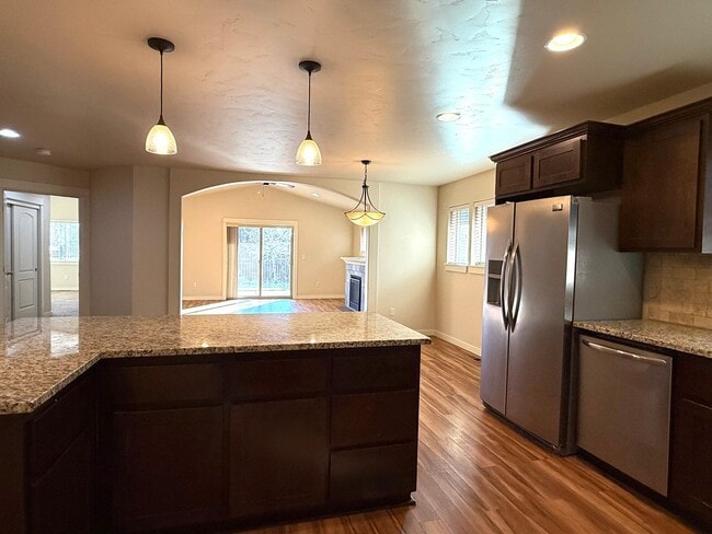 Photo - 4 Bedroom Home: Fenced Backyard & Great Location!