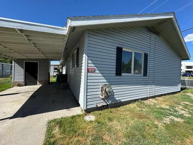 Photo - 2bdrm, 1 bath duplex with carport and fenced yard