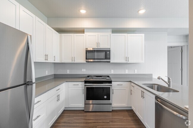 3BR, 2BA - 1,405SF - Kitchen - Doug Fir Apartments