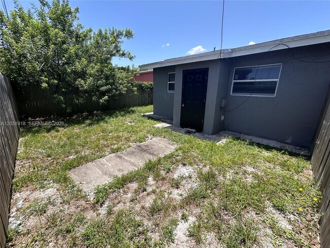 3070 NW 12th Ct Unit 1-2