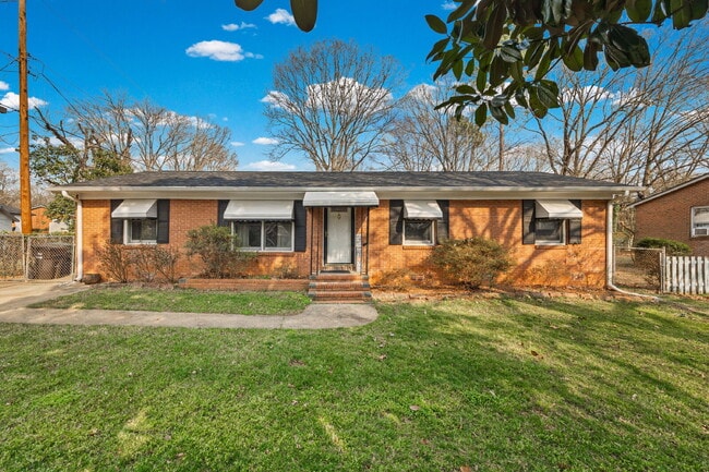 Building Photo - Classic Brick Ranch with 24x24 Workshop, Fenced Yard & Garden Beds
