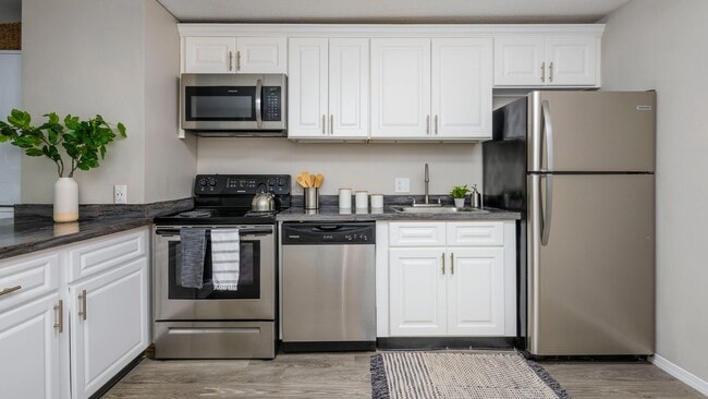 Level up your college life in our fully equipped kitchen with stainless steel appliances - a stylish hub for sharing culinary adventures with roommates.