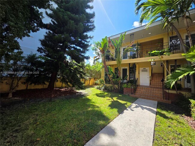 Building Photo - 8024 Harding Ave Unit 4