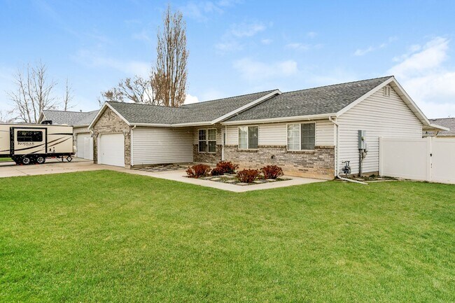 Photo - Modern 3 Bed, 2 Bath Home with LVP Flooring & 2-Car Garage! - Available NOW!